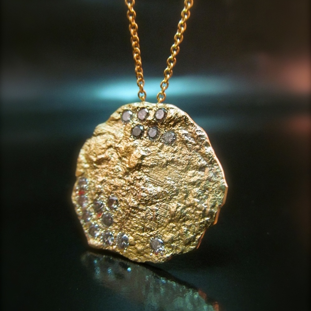 Gold diamonds necklace.